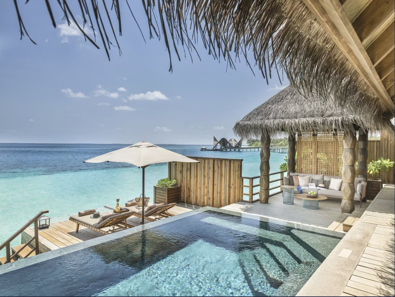 Private overwater pool terrace at JOALI Maldives