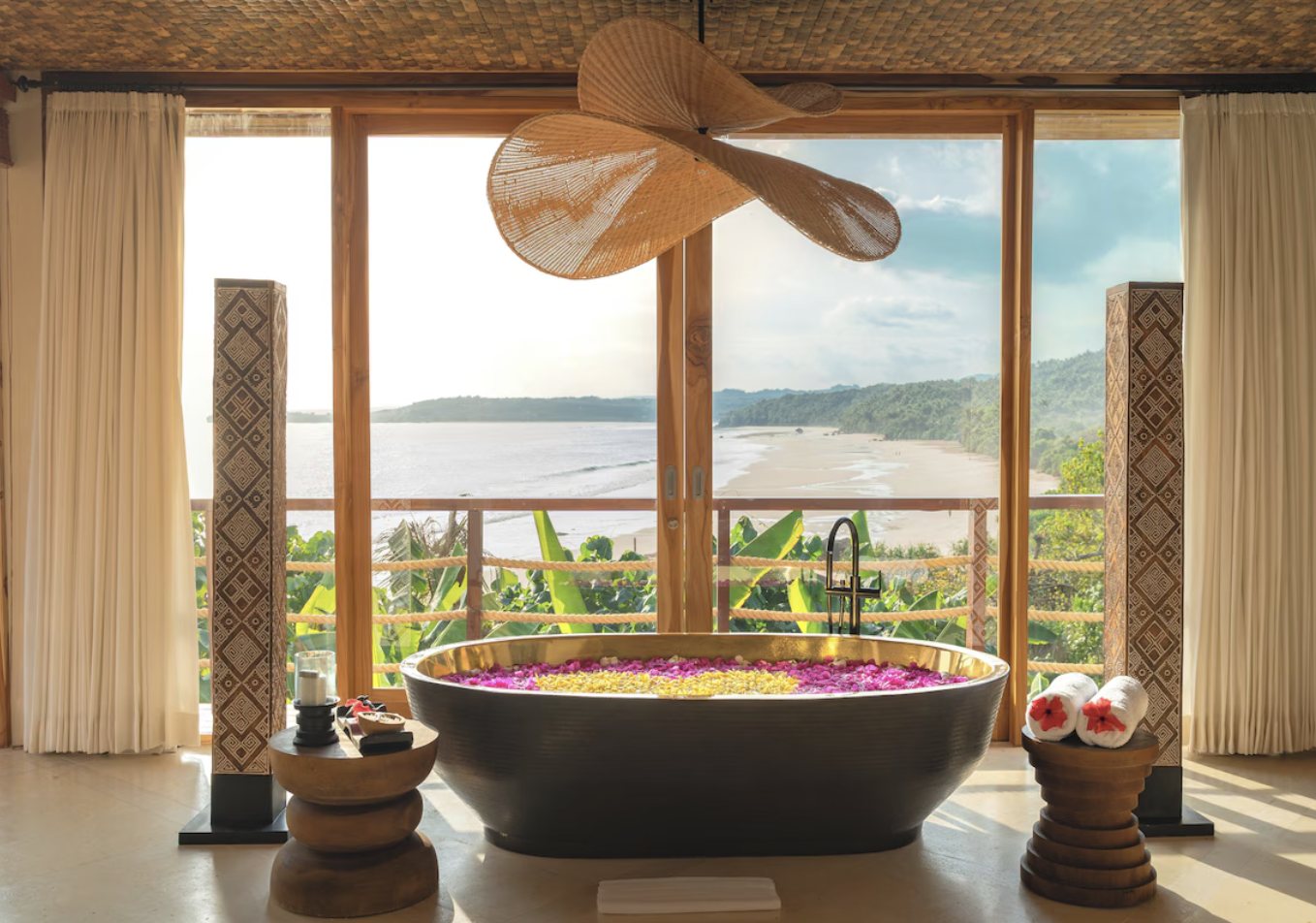 Flower bath overlooking the coastline at NIHI Sumba