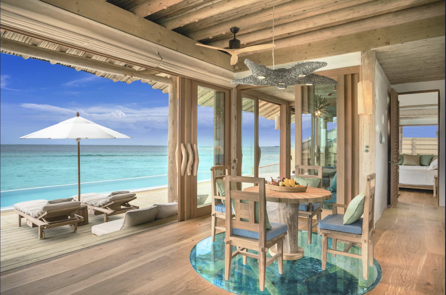 Oceanfront villa interior and pool at Soneva Fushi
